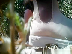 Blonde pissing in the nature