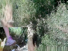 Blonde pissing in the nature