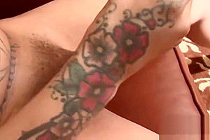 Inked trans babe masturbates after shower