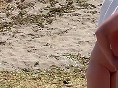 Nudist Milfs Sexy and Horny Tanning Nude At The Beach
