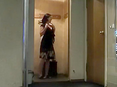 Peeping while a woman wipes herself off