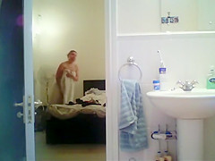 Tattooed babe spied in the shower