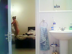 Tattooed babe spied in the shower