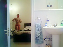 Tattooed babe spied in the shower