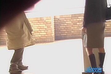 This hot Asian got skirt sharked while smoking a cigarette