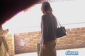 This hot Asian got skirt sharked while smoking a cigarette