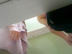 Woman blows hard cock in change room